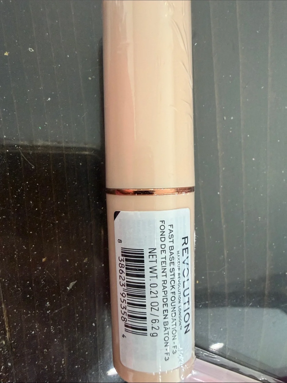 Revolution Pink Cream Blush Stick & Pot Duo, cosmetic bag, and foundation stick